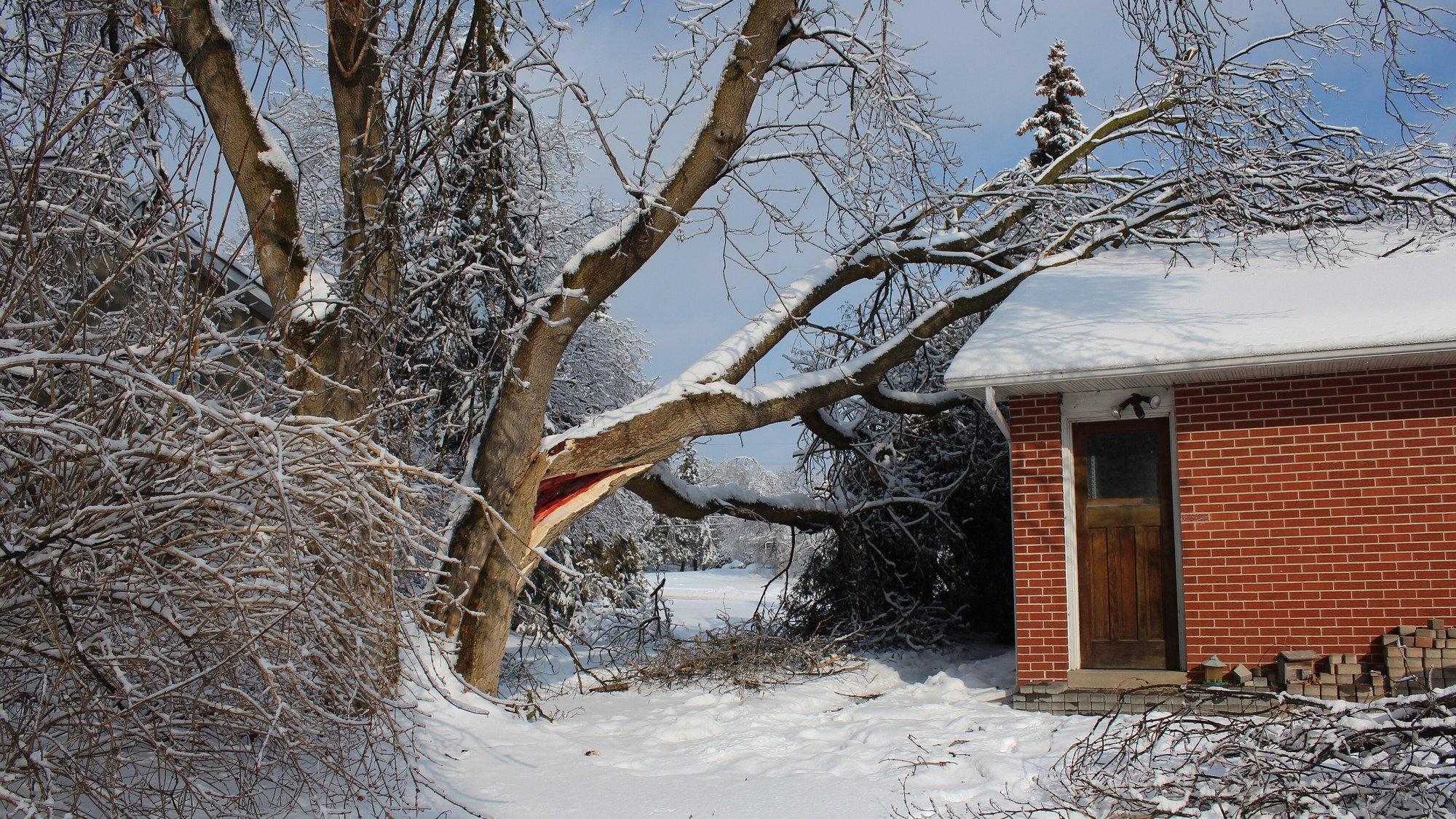 storm damaged house roof