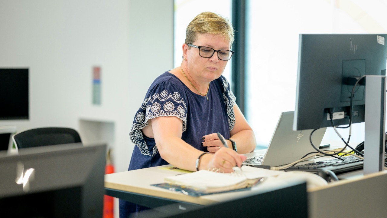 a person sitting at a desk
