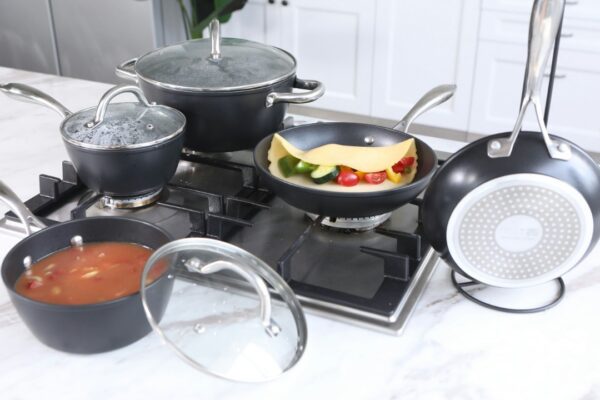 stainless steel cooking pots on stove