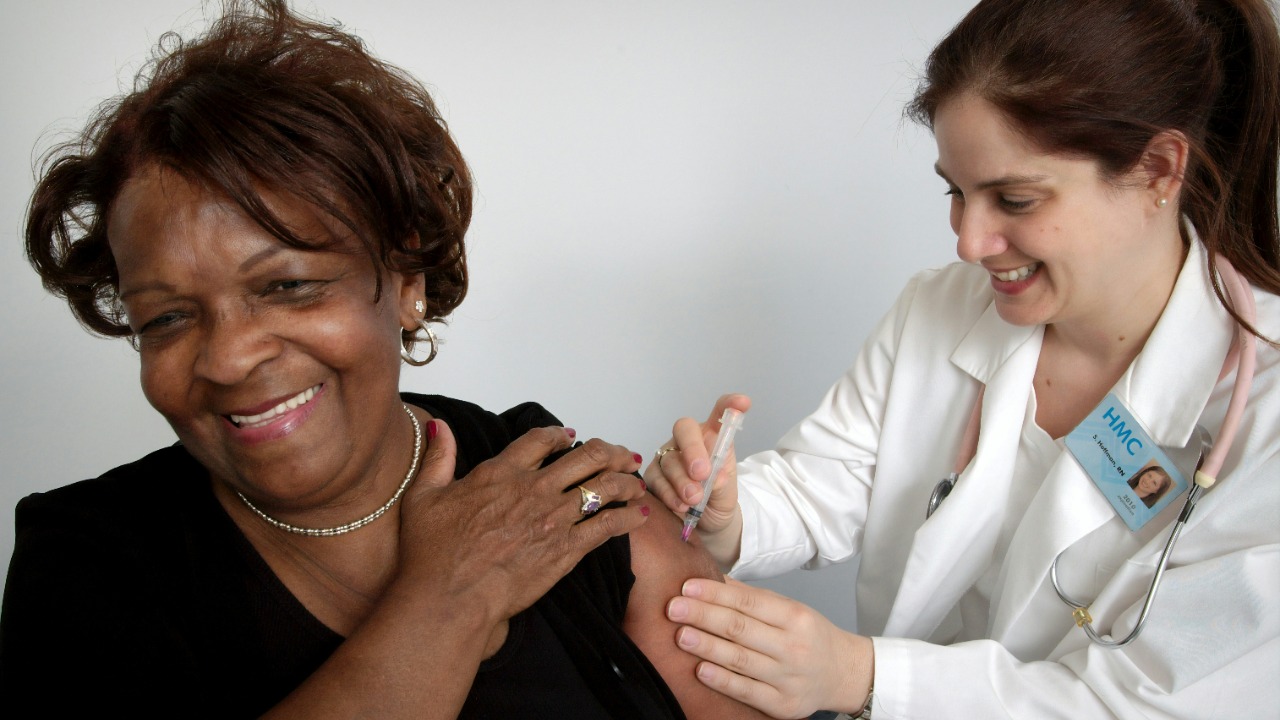 woman getting vaccine