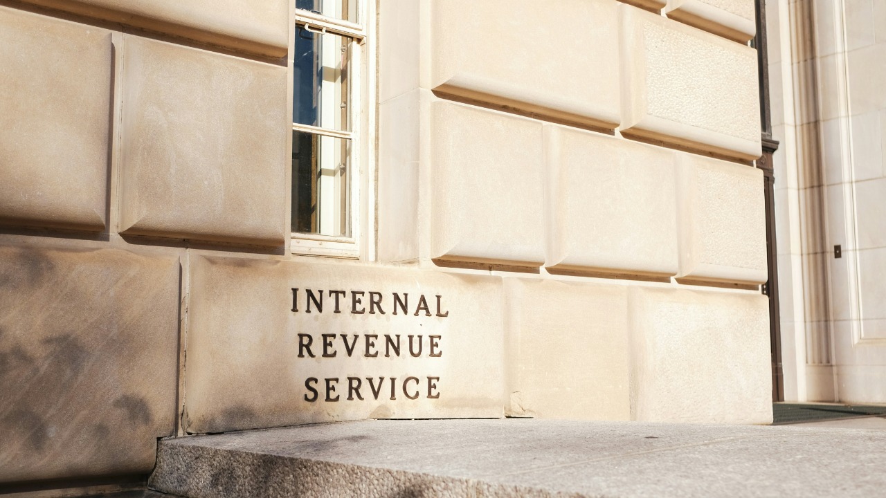 A close up of a building with a sign on it
