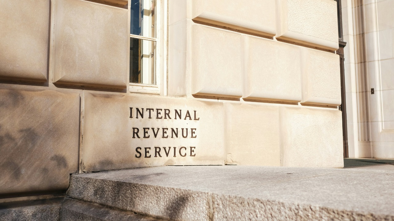 A close up of a building with a sign on it